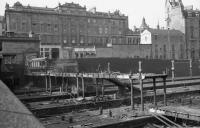 Looking over the parapet of Guild Street bridge in Aberdeen in March 1973 as the platform canopies and covered footbridge at the north end of the station are demolished.<br><br>[John McIntyre 07/03/1973]