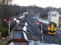 153310 approaches Barnetby as coal empties set off for Immingham. 4th February 2015.<br>
<br>
<br><br>[Graeme Blair 04/02/2015]