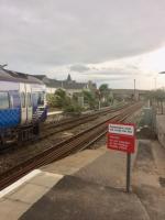 The 0900 Inverness to Aberdeen service, formed of two unidentified Class 158 units, waits to cross the 0819 Aberdeen to Inverness service at Elgin on 29th August 2017. Just before the bridge is the junction for the goods yard, formerly the connection to Elgin East (GNoSR) station. The junction was temporarily removed during the<br>
engineering works a couple of weeks later.<br>
<br>
<br><br>[Caleb Abbott 28/08/2017]