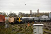 Two rakes of Class 387 EMUs in the sidings close to Didcot station, all in new GWR colours. EMU 387-162 on show. 9th November 2017.<br>
<br>
<br><br>[Peter Todd 09/11/2017]
