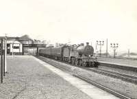 A St Enoch bound train from Ardrossan Winton Pier runs through Elserslie station on 14 September 1957 behind class 2P 4-4-0 40626. <br><br>[G H Robin collection by courtesy of the Mitchell Library, Glasgow 14/09/1957]