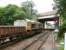 The 0740 (Sunday) Cambuslang - Millerhill ballast train runs south past Newcraighall station on 17 September 2017 behind GBRf 66741 <I>'Swanage Railway'</I>.<br><br>[John Furnevel 17/09/2017]