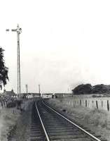 Looking east towards Banff at Inverboyndie level crossing on 23 August 1963. [Ref query 6 November 2017] <br><br>[G H Robin collection by courtesy of the Mitchell Library, Glasgow 23/08/1963]