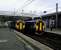 A delayed Stranraer service (right) changes crew at Ayr on 10 October. The train on Platform 3 (left) is not a northbound service but will form the next one southbound, to Girvan, in about 45 minutes.<br><br>[David Panton 10/10/2017]