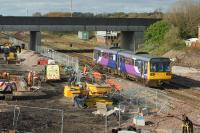 A Northern Class 142 on a Colne to Blackpool South service approaches Kirkham North Junction on 27th October 2017. The junction lies just beyond the road bridge. Visible above the leading coach, is Kirkham North Junction signal box, which will signal its last trains on 10th November 2017.<br><br>[John McIntyre 27/10/2017]