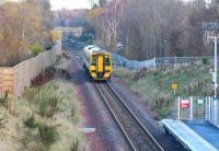 ScotRail 158741 passes the site of Hardengreen Junction [see image 17896] on 30 November 2017 with the 0924 Edinburgh - Tweedbank. The train is about to make its next scheduled stop at the 2015 Eskbank station. Visible beyond the smoke stained arch of the bridge in the background is the up platform of the original (1847-1969) station.<br><br>[John Furnevel 30/11/2017]