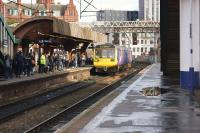 A two car Class 142 Pacer arrives at Manchester Oxford Road station on 20 October 2017 with a service to Southport. A few minutes were lost trying to get all the passengers onto an already busy train.<br><br>[John McIntyre 20/10/2017]