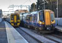 158721 on the 11.48 from Stirling to Edinburgh passes 380 004/114 on the 12.01 Edinburgh - Glasgow Queen Street, at Linlithgow.<br><br>[Bill Roberton 10/12/2017]