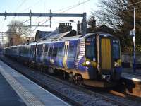 380 113 and 380 020 call at Linlithgow with the 12.00 Glasgow Queen Street - Edinburgh train.<br><br>[Bill Roberton 10/12/2017]