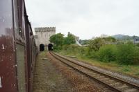 A view from the train of the eastern portal of the Conwy tubular bridge on 29 May 2013. The white splash marks on the carriage were courtesy of the Dollands Moor to Irvine china clay train that had pulled up alongside us at Warrington Bank Quay!<br><br>[John McIntyre 29/05/2013]