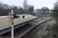 The disconnected semaphore at Poulton still stands over the Down Line but not for much longer. This was the scene on 9th December 2017 with refurbishment work continuing on the island platform but no masts in the station area yet. [See image 39235] for the same location five years earlier.  <br><br>[Mark Bartlett 09/12/2017]
