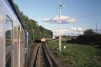 40006 approaches Murthly heading an Inverness - Edinburgh service and is about to cross 26037 + 26010 awaiting clearance.<br><br>[Graeme Blair 16/08/1978]