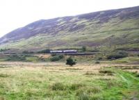 The mid afternoon southbound ScotRail service on the far north line, having recently left Rogart heading for Lairg in the summer of 2007. [Ref query 18 December 2017]<br><br>[John Furnevel 30/08/2007]
