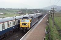 47702 awaits the northbound passage of 26023 + 26010 at Newtonmore in July 1980.<br><br>[Graeme Blair 19/07/1980]