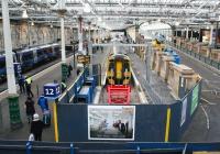 A Network Rail recruitment poster adorns the hoarding fronting the recently extended platform 12 at Waverley on 21 December 2017. [See news item] <br><br>[John Furnevel 21/12/2017]