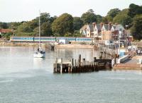 Peaceful scene at Lymington Pier on 26 July 2002, with a train at the platform awaiting its departure time on the shuttle service to Brockenhurst.<br><br>[Ian Dinmore 26/07/2002]