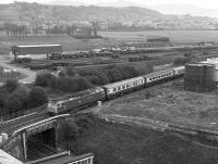 47461 <I>Charles Rennie Mackintosh</I> about to cross over the Edinburgh Suburban line with a WCML portion from Carstairs in 1982.  Beyond is the civil engineers depot. [Ref query 14 January 2017]<br>
<br><br>[Bill Roberton //1982]