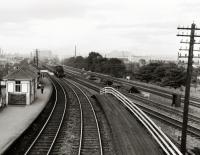 The view east from the footbridge of Balgreen Halt on the Corstorphine branch, with the main Edinburgh and Glasgow Railway to the right.<br><br>[David Murray-Smith 14/08/1961]