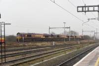 66's still dominate on freight at Didcot, although apparently GBRf are taking over some DB EWS turns. 66108, 66103 and 66030, running light from Acton to Hinksey (Oxford), pass through on a murky 20th January 2018.<br>
<br>
<br><br>[Peter Todd 20/01/2018]