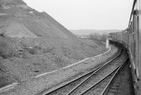 A northbound class 47-hauled train passes the points for Clatchard Craig quarry siding in 1985.<br>
<br>
<br><br>[Bill Roberton //1985]