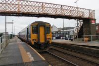 156448, working from Barrow to Carlisle, stands alongside one of the original Harrington Humps at the station of the same name. Still not exactly <I>level access</I> but much easier to get in at the rear door than the others. 13th November 2017. <br><br>[Mark Bartlett 13/11/2017]
