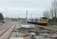 The view east from the original island platform at Kirkham on 30th January 2018. Work is still in progress but services to Blackpool South had resumed the previous day. A Pacer/Sprinter combination arrives from Preston in the branch platform. The Down Blackpool North line is on the left along with the new Up line.<br><br>[Mark Bartlett 30/01/2018]