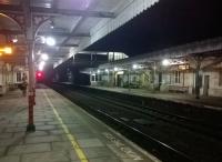 Just one passenger is visible on Kemble station on the 3rd of January 2015. View looks South East.<br><br>[Ken Strachan 03/01/2015]