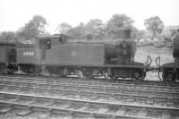 C16 4-4-2T no 67489 languishes in the sidings at Hawick in the summer of 1958.<br><br>[Robin Barbour Collection (Courtesy Bruce McCartney) 10/08/1958]