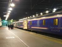The Lowland Caledonian Sleeper, hauled by 92043, photographed soon after arrival at Euston in February 2018. The new Mark 5 Sleeper coaches will not now be introduced until October 2018. [See recent news item]<br><br>[Colin McDonald 08/02/2018]