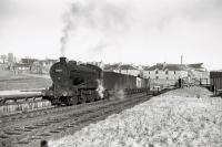Class J39 0-6-0 64590 at Inverbervie on freight to Montrose in January 1962. [Ref query 9 February 2018]<br><br>[David Murray-Smith 27/01/1962]