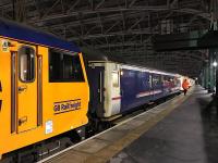 92043 waits at Platform 10 to take the Lowland Sleeper out of Glasgow Central in February 2018.<br><br>[Colin McDonald 07/02/2018]