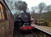 USATC 5197 makes a dramatic sight as it enters Consall station with the 16.53 to Cheddleton. The steam gala featured two American engines and one from Swindon via Aberbeeg.<br><br>[Ken Strachan 03/02/2018]