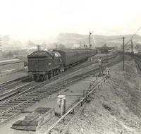 V1 67616 leaving Dumbarton Central on 20 April 1957 with a train for Helensburgh. The view is from the signal box and the line on the right dropped down to serve the Leven Engine Works.<br><br>[G H Robin collection by courtesy of the Mitchell Library, Glasgow 20/04/1957]