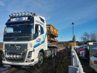 The morning of 7th February 2018 at Stonehaven, with a low loader being loaded on the former goods siding with the weekend's railway maintenance wagons before the rail/road digger loaded itself.<br>
<br>
<br><br>[Alan Cormack 07/02/2018]