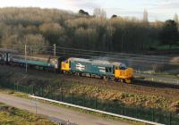 One of the two Cumbrian Coast Class 37 diagrams was supposed to move to Class 68 haulage before the end of January 2018 but two 37s continued in use during the first week of February. 37424 <I>Avro Vulcan XH558</I> propels the 2C32 Carlisle to Preston service at Morecambe South Junction on a sunny 2nd February 2018. <br><br>[Mark Bartlett 02/02/2018]