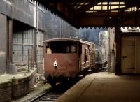 An unidentified Clayton Type 1 waits for the road at Waverley's platform 21 with a single container and ex-LMS brake van in the early 1970s.<br>
<br>
<br><br>[Bill Roberton //1970]