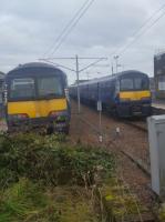 Two Class 320 EMUs at Lanark on 21st February 2018. On the right an original Scottish set and on the left one of the refurbished ex-London Midland sets.<br>
<br><br>[John Yellowlees 21/02/2018]