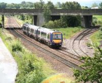 The First ScotRail 1100 Edinburgh - Dundee has just passed below the A90 and is about to run through Dalmeny Junction on 26 June 2008.<br><br>[John Furnevel 26/06/2008]