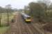 3-car Pacer 144014, on a Leeds to Morecambe service, clatters along jointed track at Greystonegill Bridge in the Wenning Valley near Bentham on 2nd December 2017. <br><br>[Mark Bartlett 02/12/2017]