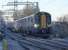 380 114 and 380 104 leave a sub-zero Linlithgow with the 11.00 Glasgow Queen Street service, on the first day of electric operation. <br><br>[Bill Roberton 10/12/2017]