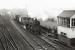 Bucksburn seen from the south of the station. Class 4MT 76104 flagged to halt circa 1961. [Ref query 9 January 2017]<br><br>[David Murray-Smith //1961]