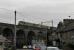 High above the Galgate rooftops 90048 and 90045 speed a Daventry to Coatbridge intermodal over the Conder Viaduct on 11th January 2018. The River Conder caused serious flooding in Galgate in November 2017, with over 150 homes affected. <br><br>[Mark Bartlett 11/01/2018]