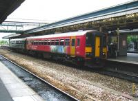 153373 in <I>Heart of Wessex</I> livery boarding at Exeter St Davids in June 2002. [See image 61958]<br><br>[Ian Dinmore 05/06/2002]