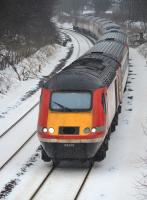 The 11.47 VTEC service from Aberdeen to London Kings Cross nears snowy but thawing Dalgety Bay on 4 March.  The train had been diverted via Perth and Newburgh due to planned (but cancelled) engineering work at Cupar. The leading power car was 43309, 43238 trailing.<br><br>[Bill Roberton 04/03/2018]