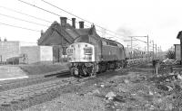 Class 40 40138, north bound with cement wagons at Beattock station in the 1970s.<br><br>[Ian Millar //1970]