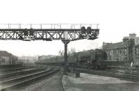 The 5.30pm St Enoch - Carlisle runs south through Gorbals Junction  shortly after commencing its journey on 20 July 1961. At the head of the train is  Stanier Pacific 46236 <I>City of Bradford</I>. <br><br>[G H Robin collection by courtesy of the Mitchell Library, Glasgow 20/07/1961]