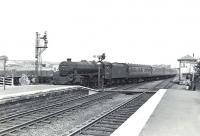 One of Motherwell shed's Black 5 4-6-0s no 45433 takes the Largs route at the north end of Kilwinning on Saturday 4 July 1959 with a train from Law Junction.   <br><br>[G H Robin collection by courtesy of the Mitchell Library, Glasgow 04/07/1959]