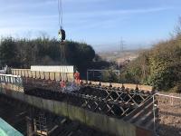 The Muirhead Road overbridge deck is cut into sections before being lifted on to waiting lorries. <br><br>[Colin McDonald 11/03/2018]