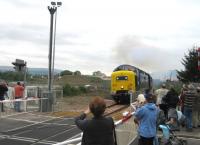 A photograph taken at Waterside Level Crossing, Causewayhead, on the re-opening of the Stirling - Alloa - Kincardine line. Deltic 55022 <I>Royal Scots Grey</I>. [Ref query 23 March 2018]<br><br>[Hamish Baillie 15/05/2008]
