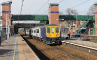 Refurbished EMU 319384 calls at refurbished Leyland station on a sunny but bitterly cold 17th March 2018. With the Manchester line closed at weekends for electrification these Liverpool Preston services were the only trains calling at Leyland, all others being 'bustituted'. <br><br>[Mark Bartlett 17/03/2018]